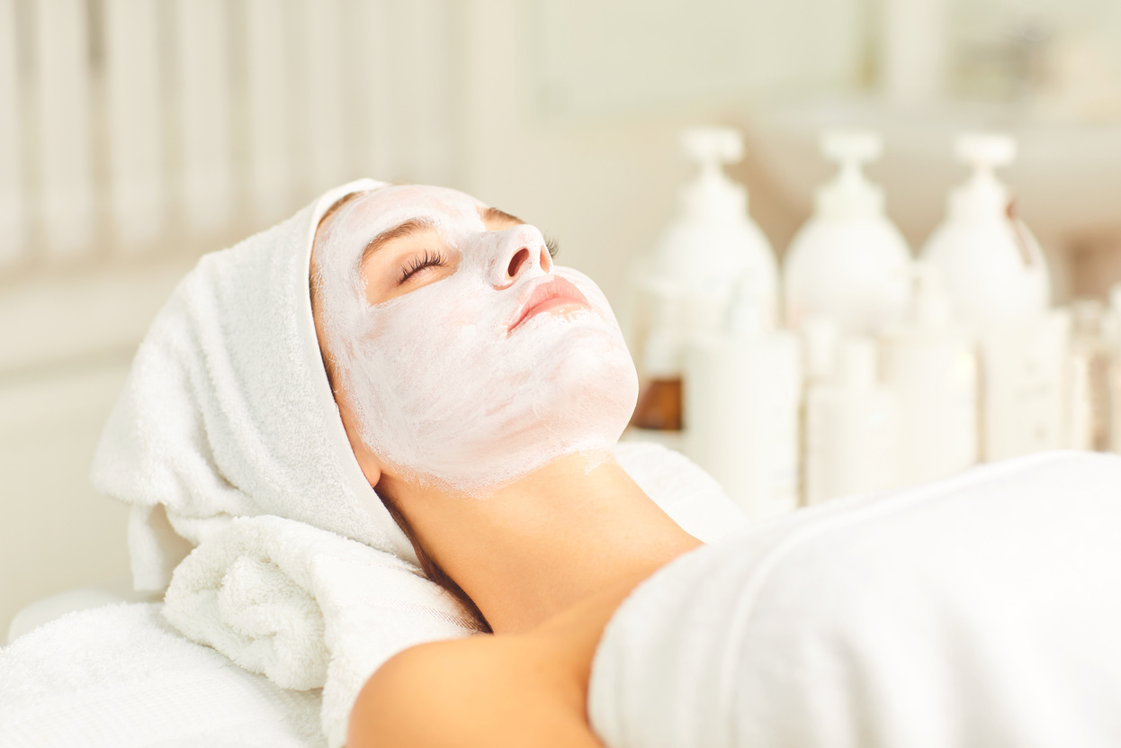 Facial Skin Treatment with a Cosmetic Mask in a Beauty Salon.